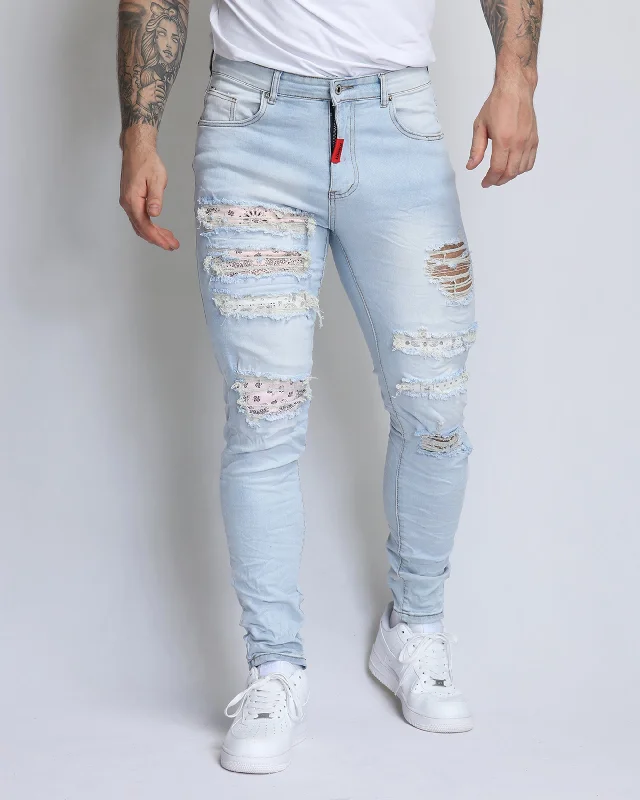 Trendy Comfort Wear Pink Cashew Blossom Patch Blue Ripped Jeans with Light Wash