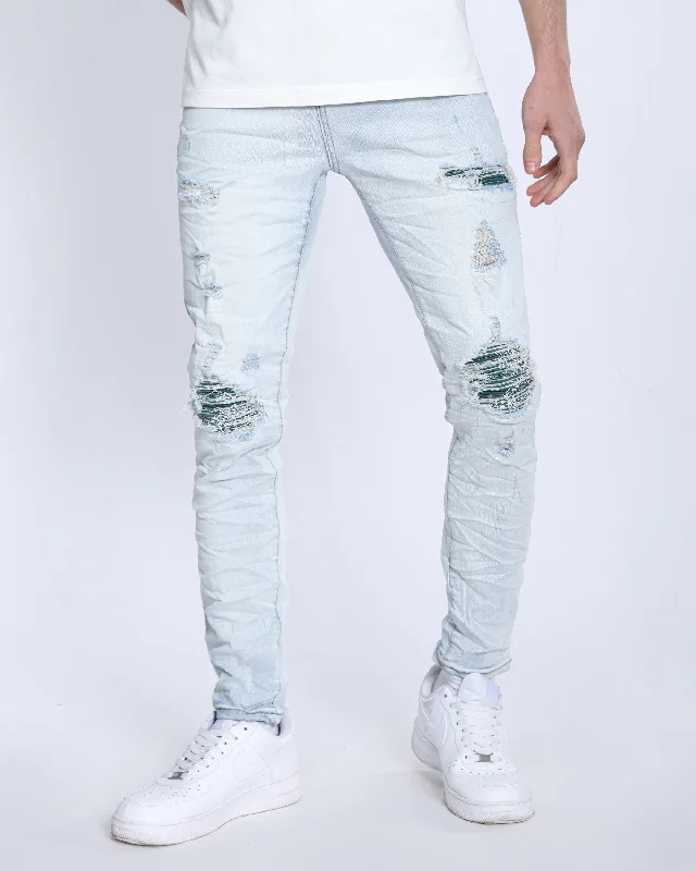 Casual Fit Light Wash Ripped Blue Jeans with Green Cashew flower patch